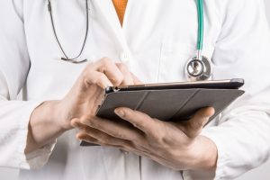 doctor-with-tablet-300×200